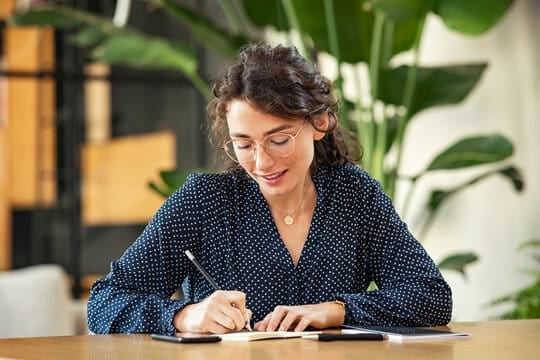 woman achiving big goals by knowing micro-habits